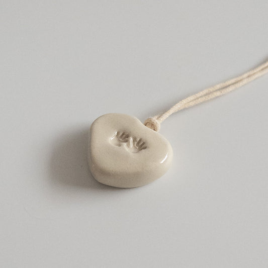Ceramic pendant Heart with palms