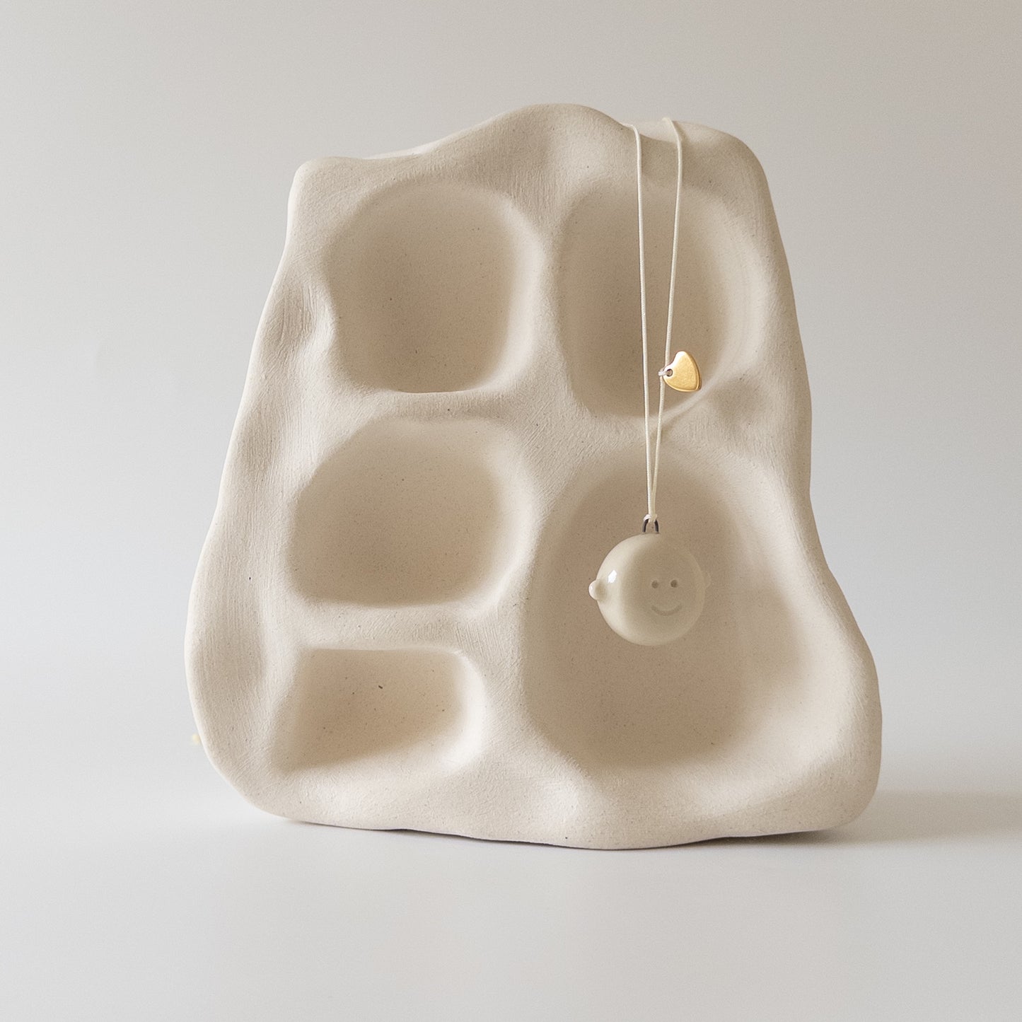 Double-sided ceramic pendant Smiley face + metal heart