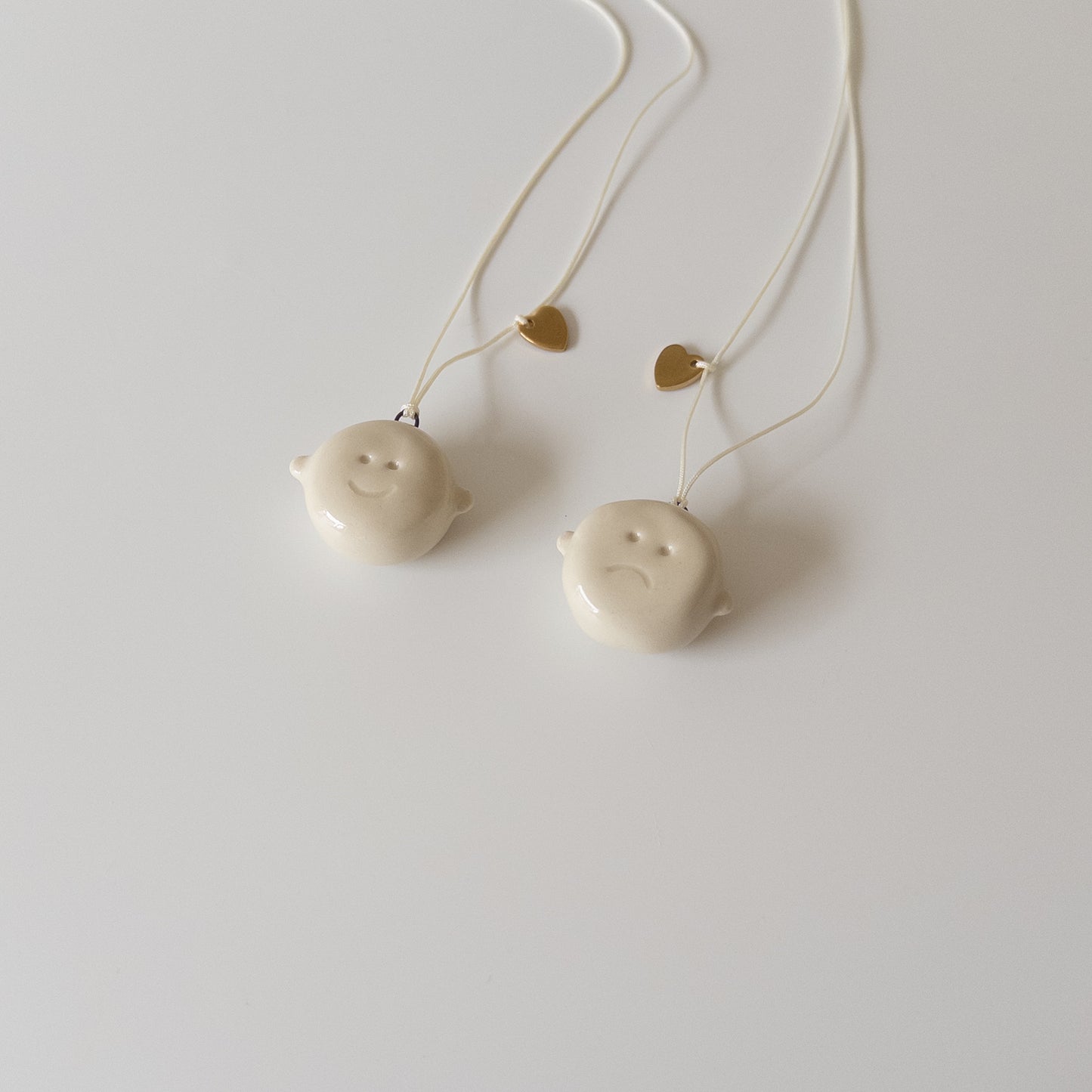 Double-sided ceramic pendant Smiley face + metal heart