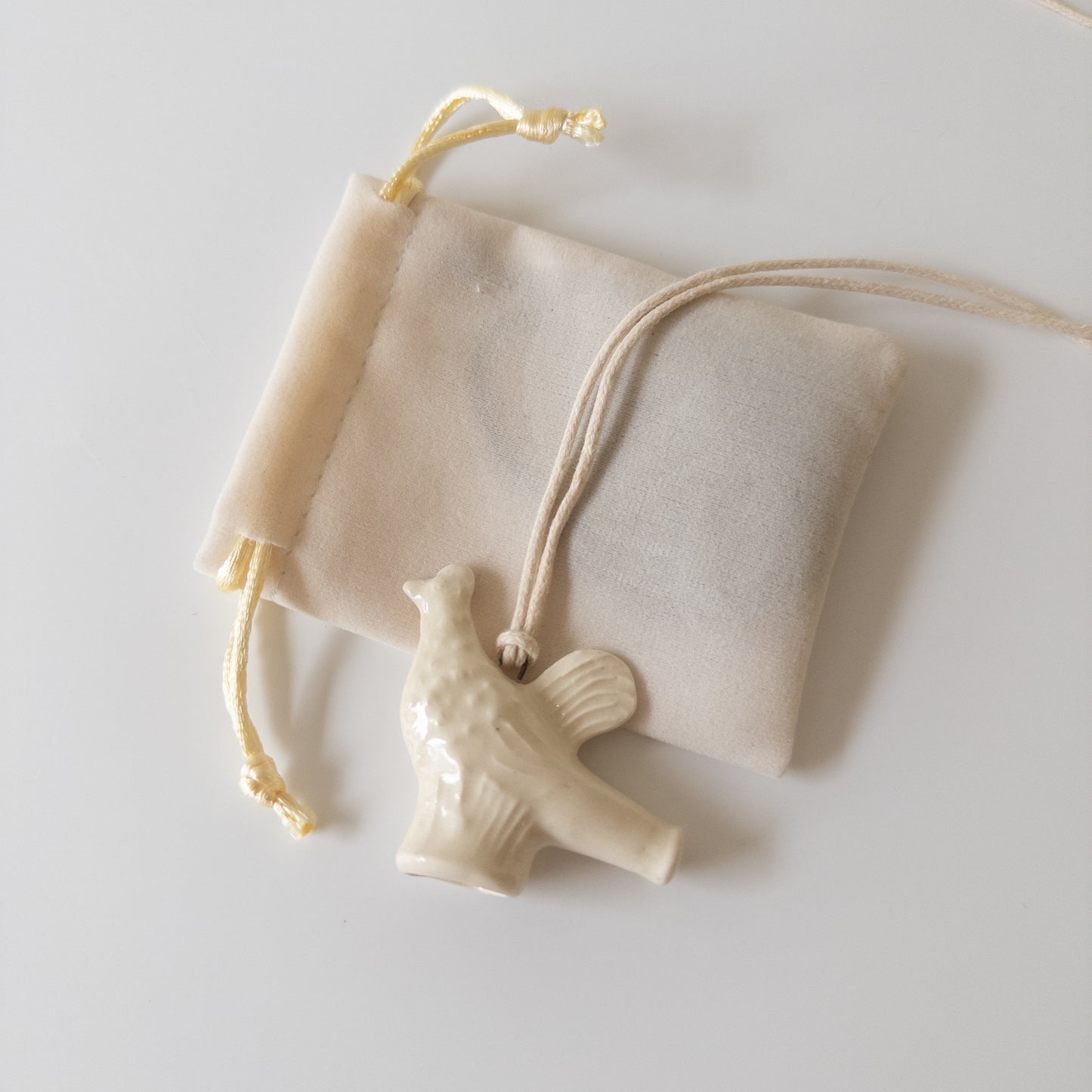 Ceramic pendant in the shape of a Chicken whistle