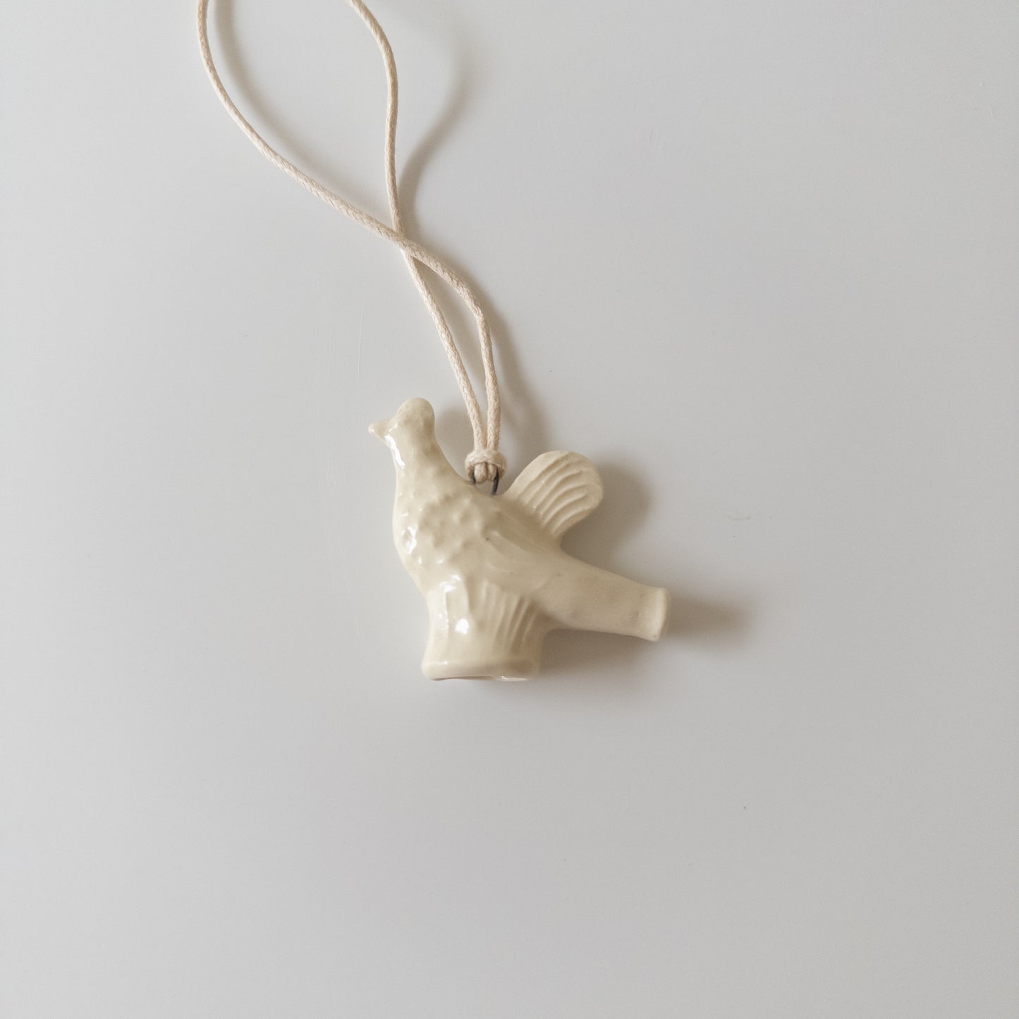 Ceramic pendant in the shape of a Chicken whistle