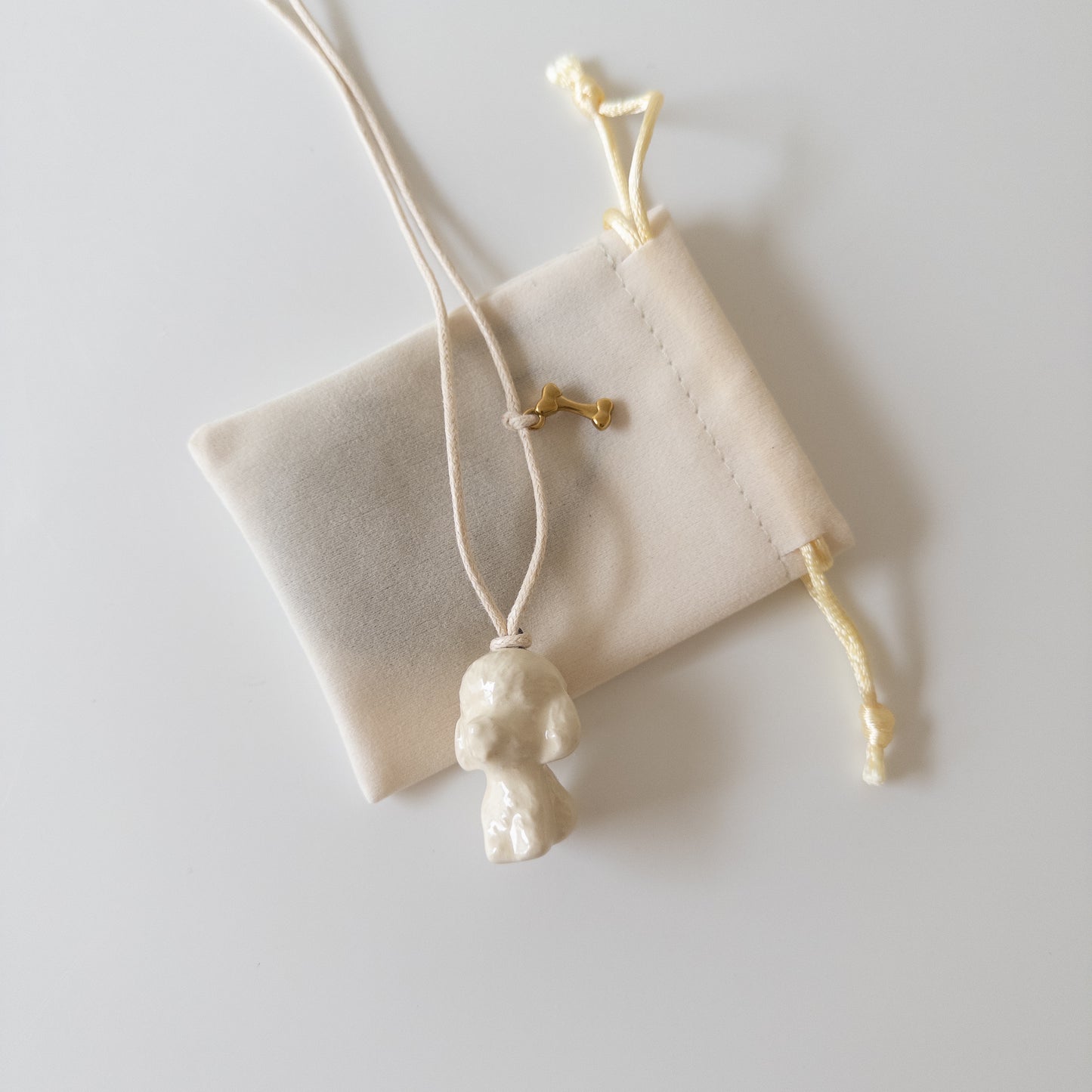 Керамічний підвіс Мальтіпу з кісточкою