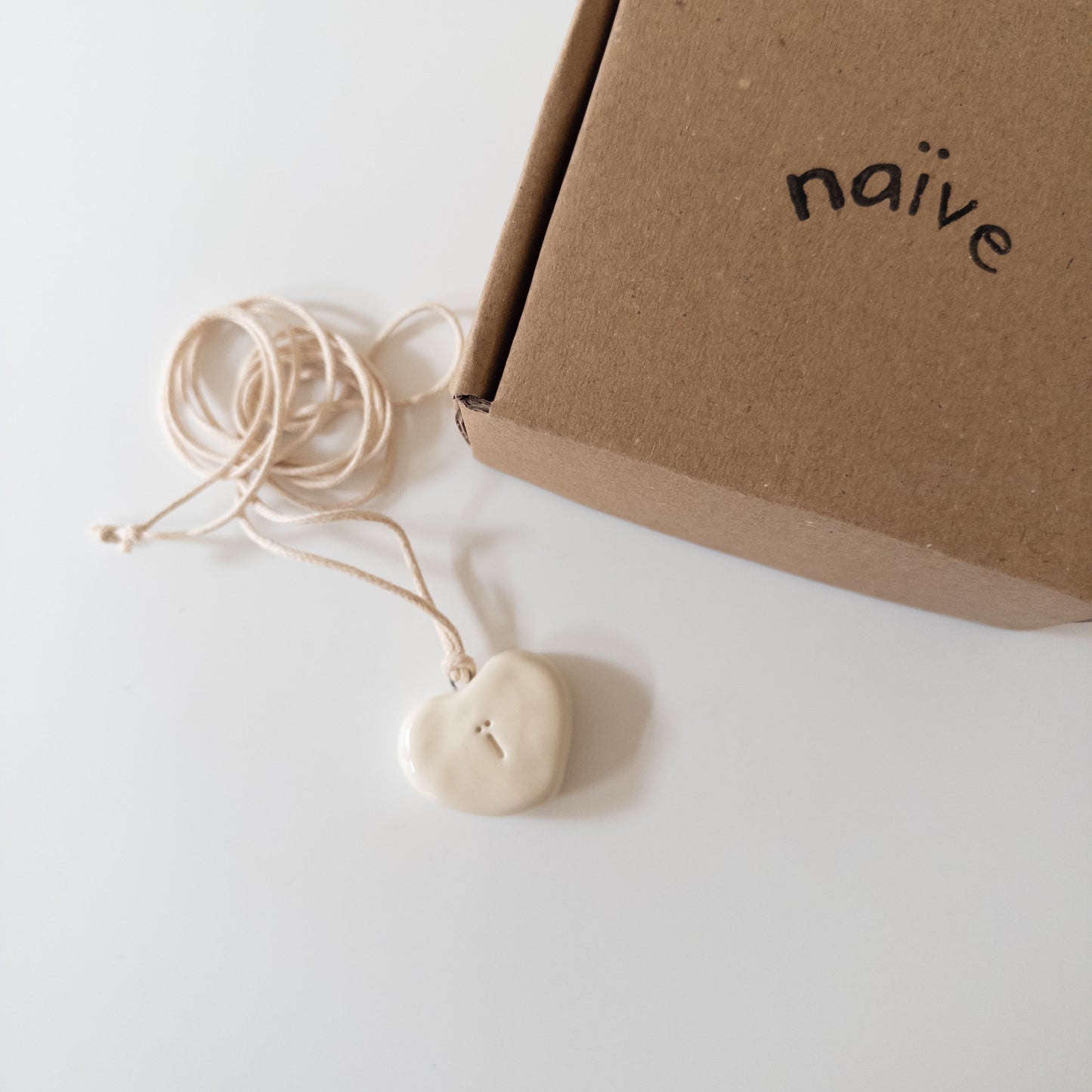 Ceramic pendant Heart with a letter