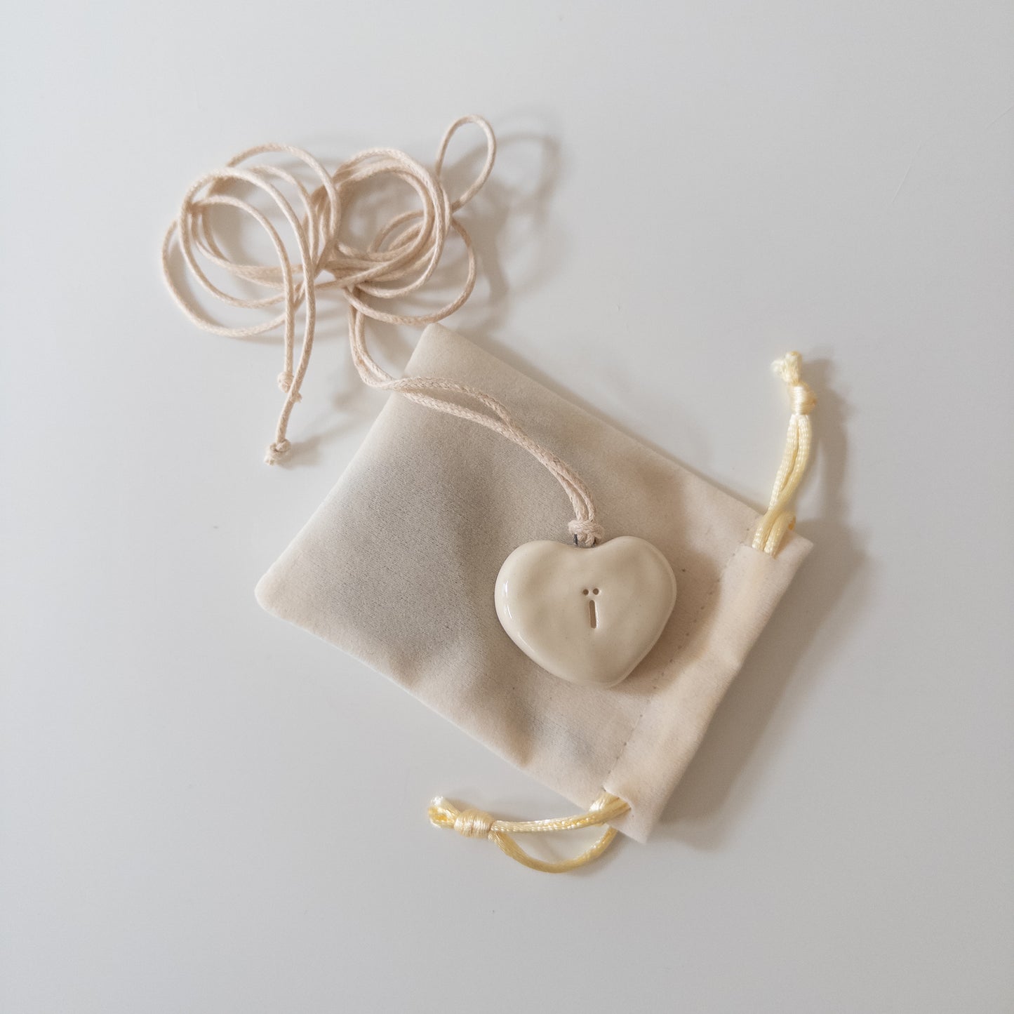 Ceramic pendant Heart with a letter