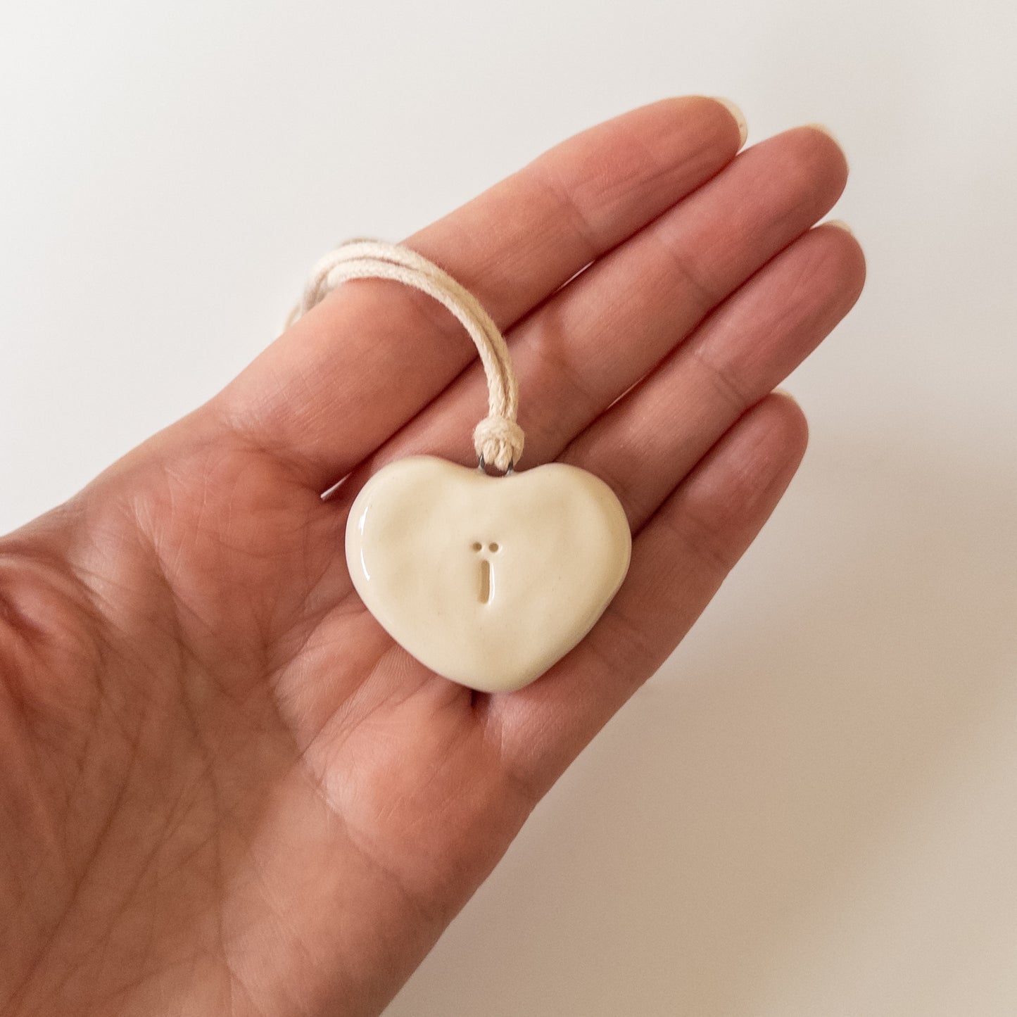 Ceramic pendant Heart with a letter