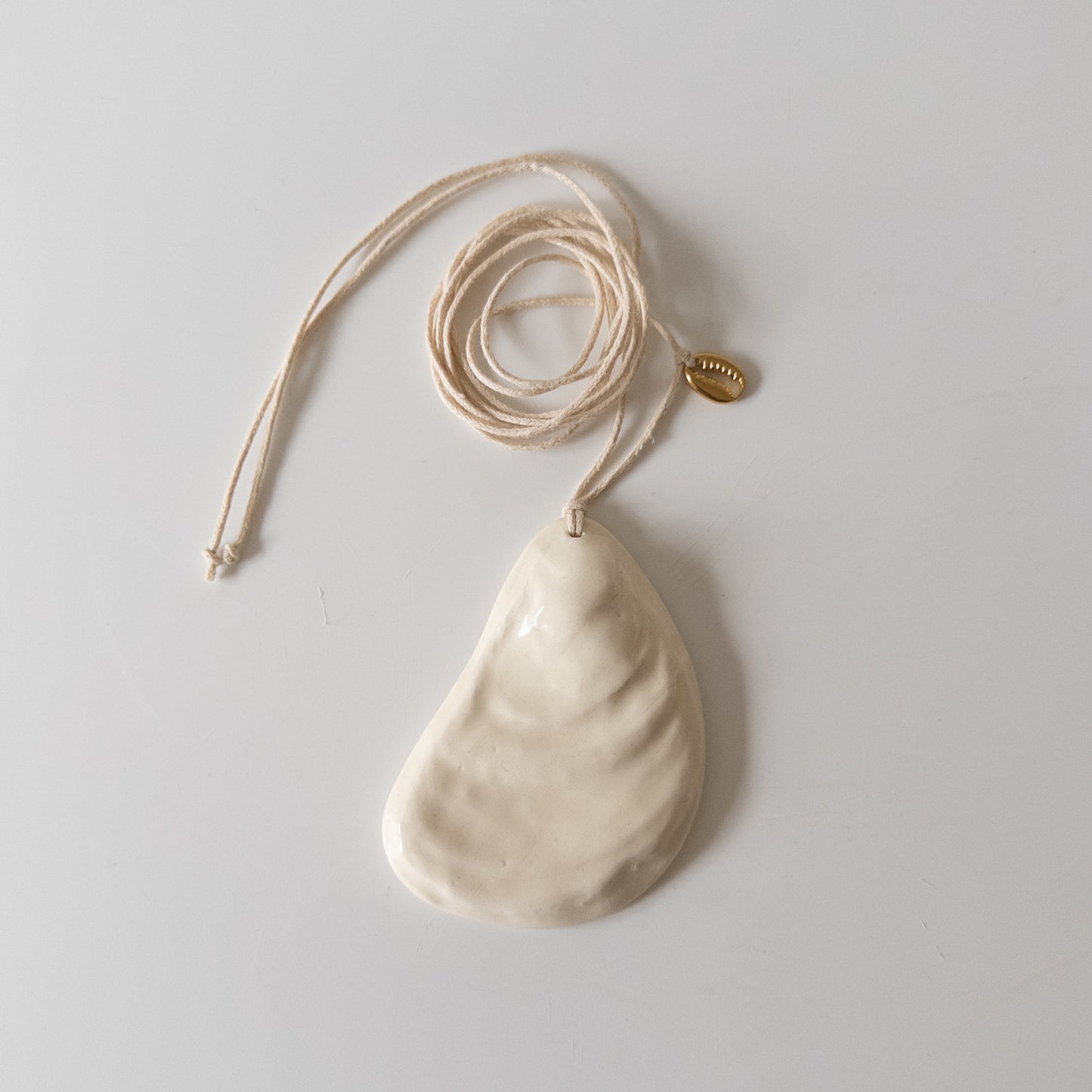 Oyster + metal cowrie