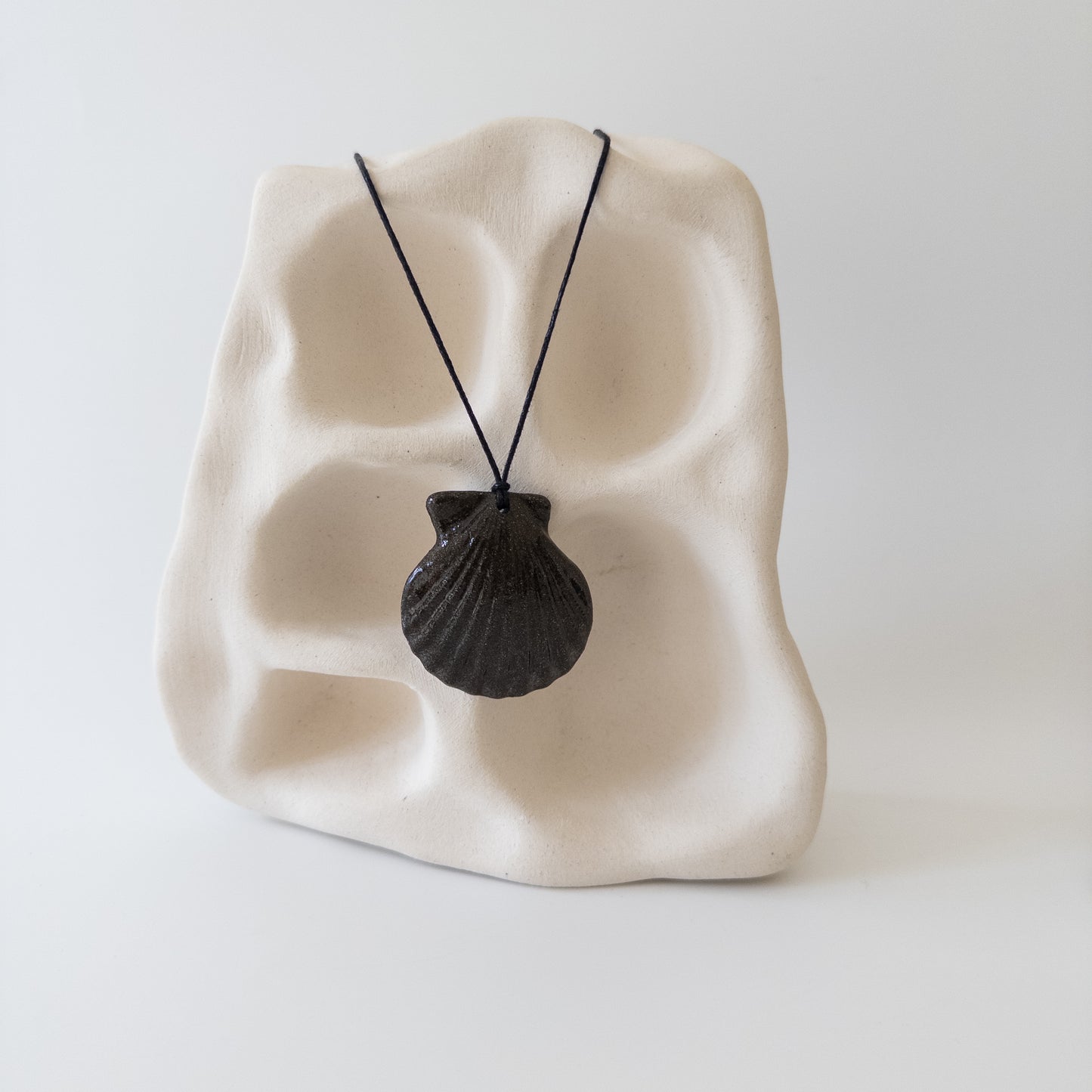 Мушля Гребінець міні (чорна)