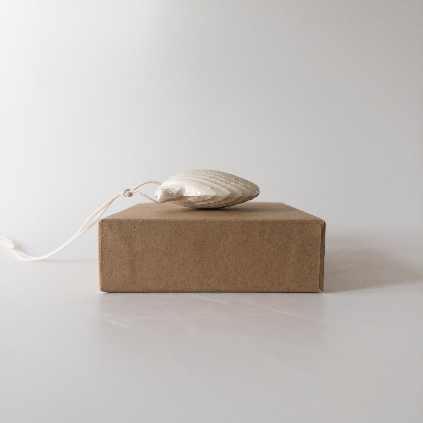 Мушля Гребінець міні [подвійна] біла