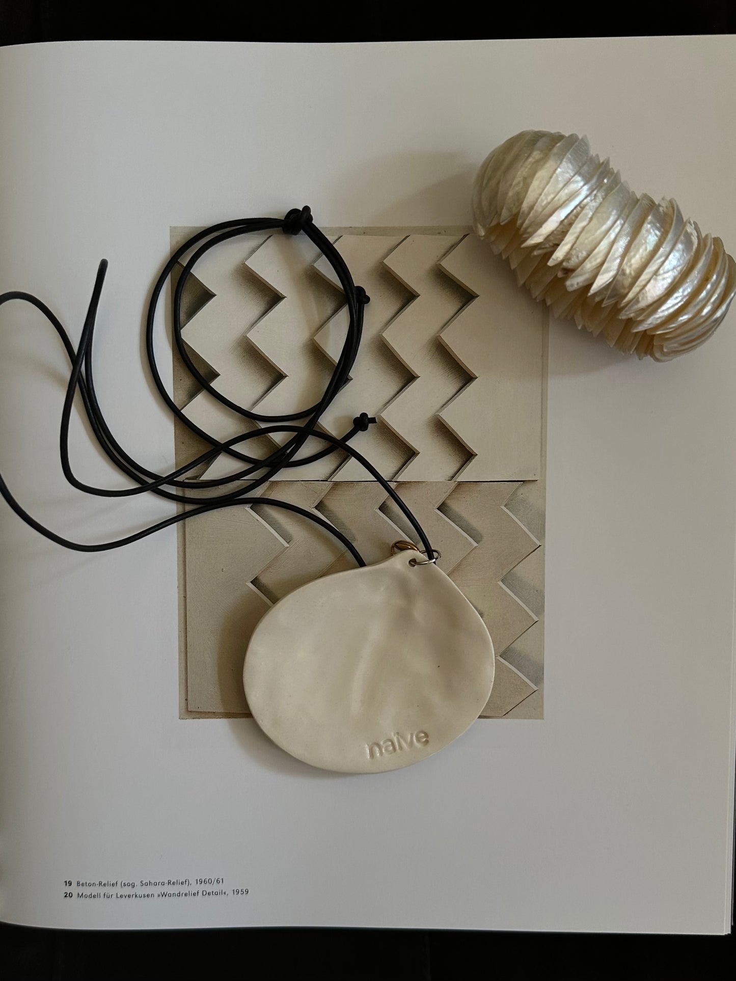 Oversized shell on a leather cord